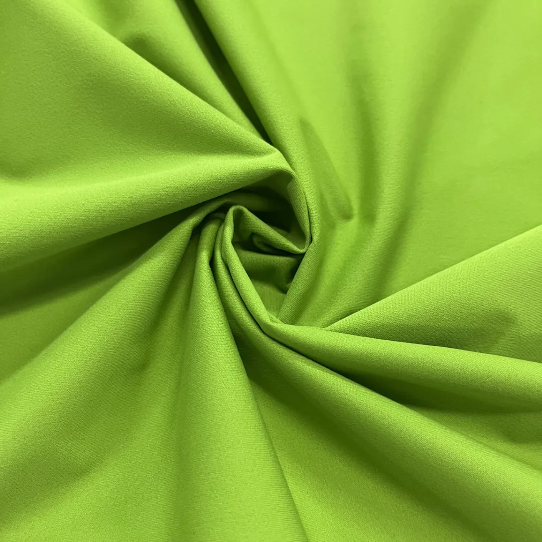 3-Layer Waterproof Breathable Polyester Fabric with Stretch - Wild Lime (Sold per Yard)