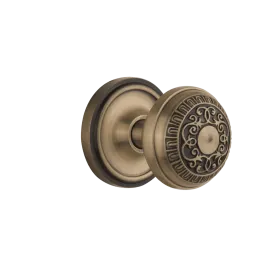 Classic Rosette with Egg & Dart Knob in Antique Brass
