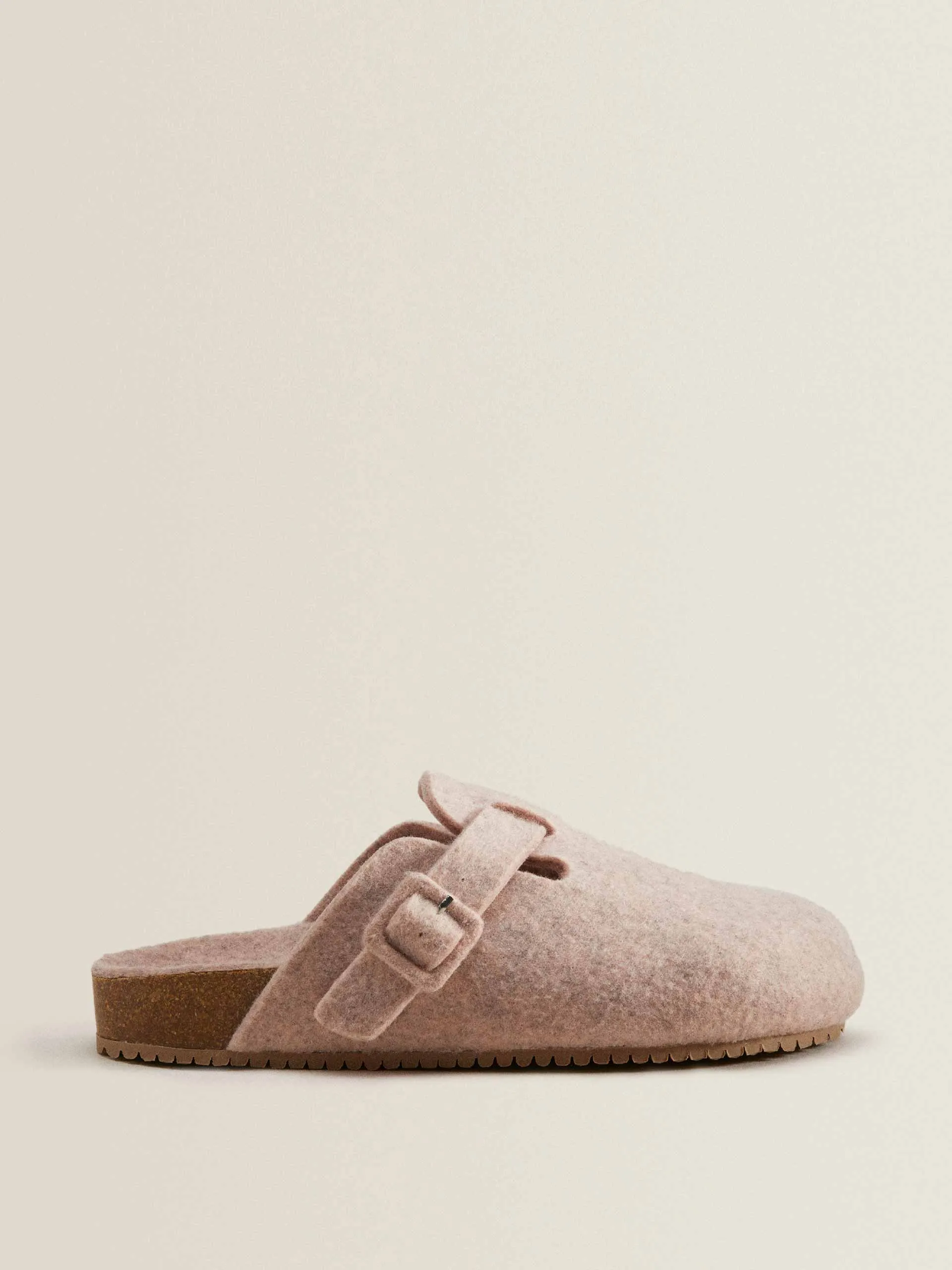 Pink buckled slippers